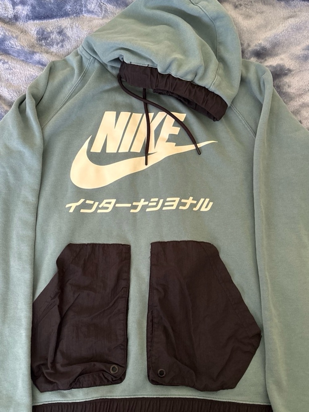 Nike International Teal Green Hoodie with Black Pocket Panels